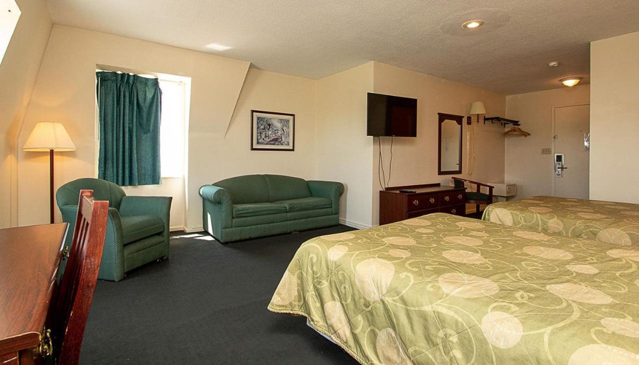 Country Squire Inn And Suites Coshocton المظهر الخارجي الصورة